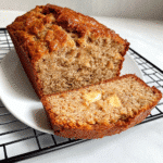Cottage cheese banana bread sliced on board